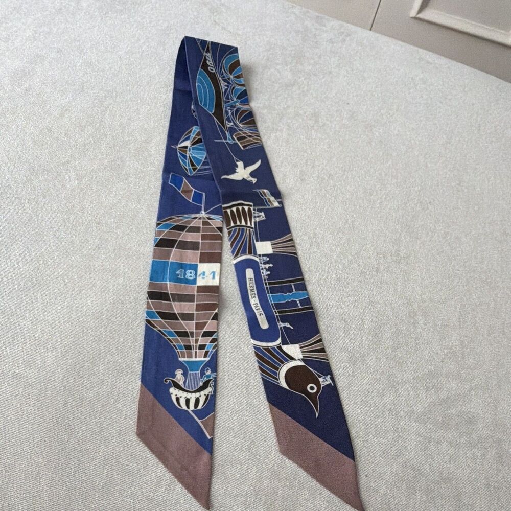 ⁠Hermes Les Folies Du Ciel Silk Twilly Scarf Blue Marine Hot Air Balloon Bird - Picture 1 of 6
